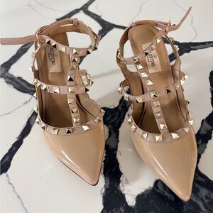 Valentino Rockstud Nude Patent caged Leather Pumps.